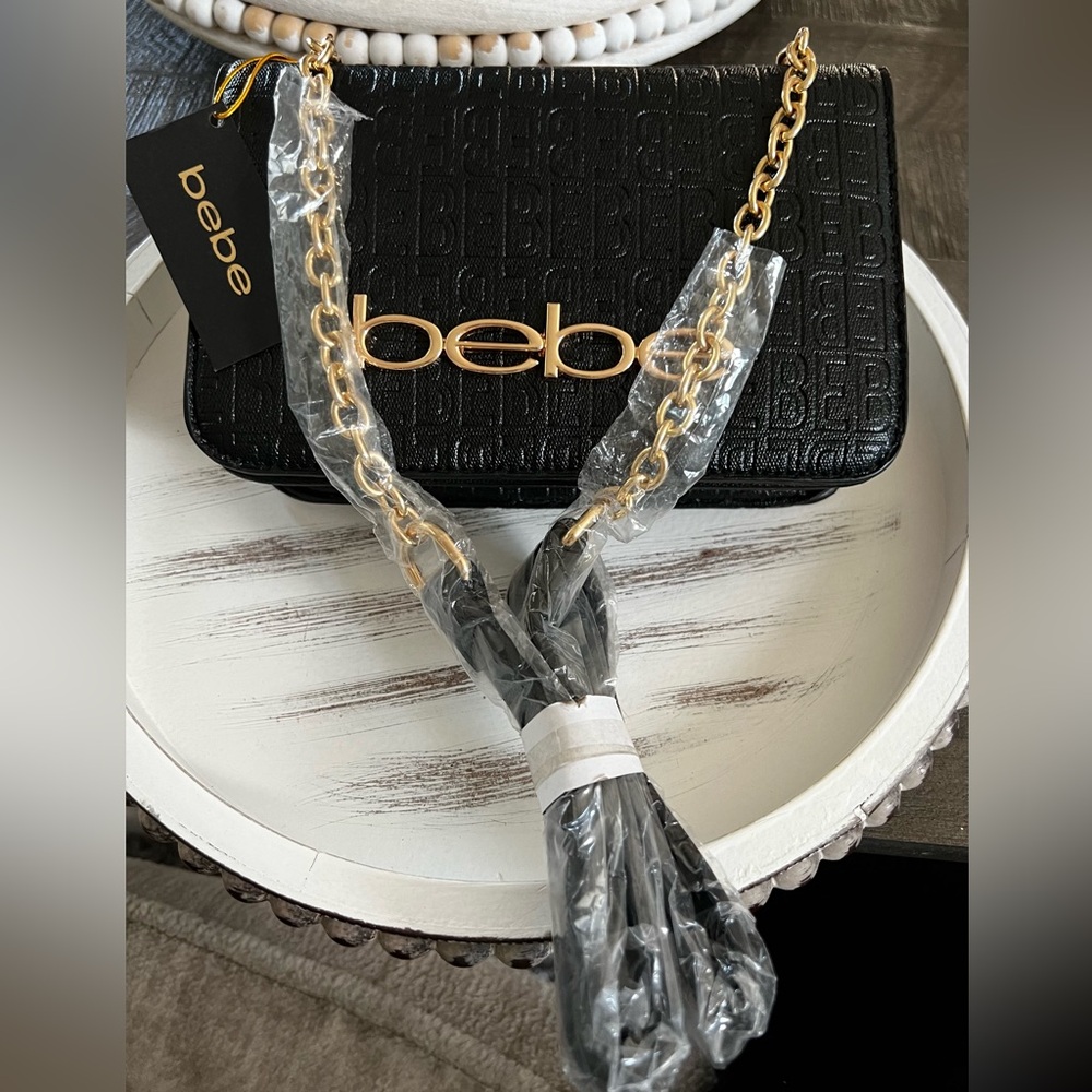 BEBE Black Crossbody with gold chain.